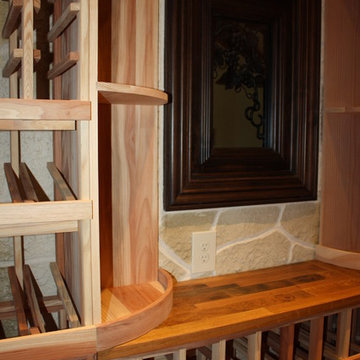 Wine Cellar Design in Texas - Premium Redwood Racks, a Window, and a Wine Barrel