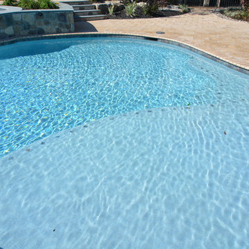 Mediterranean Free Form Swimming Pool with Spa