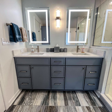 Primary Suite Remodel with Blue Cabinetry and Calacatta Miraggio Duo Quartz