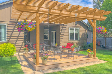 Inspiration for a patio remodel in Portland with a pergola