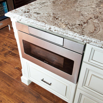 Dark Brown Kitchen with White Island