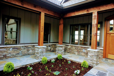 Example of a mountain style home design design in Charlotte