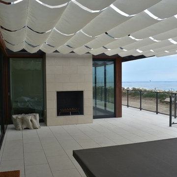 Infinity Canopy creates a transitional space at this luxury beach house