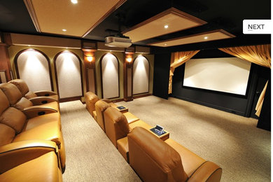 Home theater - large modern enclosed carpeted home theater idea in Philadelphia with beige walls and a projector screen