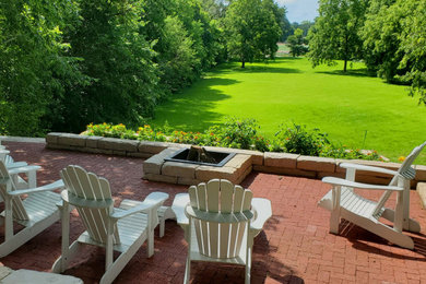 Example of a mountain style patio design in Milwaukee