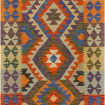 Bareens Designer Rugs - Bohemian Turkish Kilim Mariann Hand-Woven Wool Rug - 2'7'' x 4'1'' - Elevate the elegance of your home with this stunning hand-woven tribal Kilim wool rug. Meticulously crafted on a loom by the Nomad Turkman people using hand-spun wool and 100% natural vegetable dyes, these rugs are recognized for their repetitive geometric patterns, incorporating naturalistic floral and traditional designs. The contemporary fashion palette results in bold, sharp patterns that are incredibly versatile, as the pattern is the same on both sides. These reversible rugs feature a lighter shade on one side and brighter colors on the other, providing versatility according to preference. These unique rugs are made by knotting short strands of different colors onto the warps and securing them by tightly pressing the wefts. The designs are created by interweaving the various colored wefts and warps. Kilims are known for their exceptional durability and versatility, making them truly unique rugs.  Product Details    Rug Size: 2'7'' x 4'1''  Material: 100% Wool  Style: Kilim, Flat Weave, Dhurrie, Turkish, Southwestern, Rustic, Tribal  Colors: Rust, Blue  Weave Type: Hand-Woven, Handmade  Pile Height: Less than 0.25 inch
