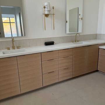 Multiple Room Cabinetry Reface with Partial Build