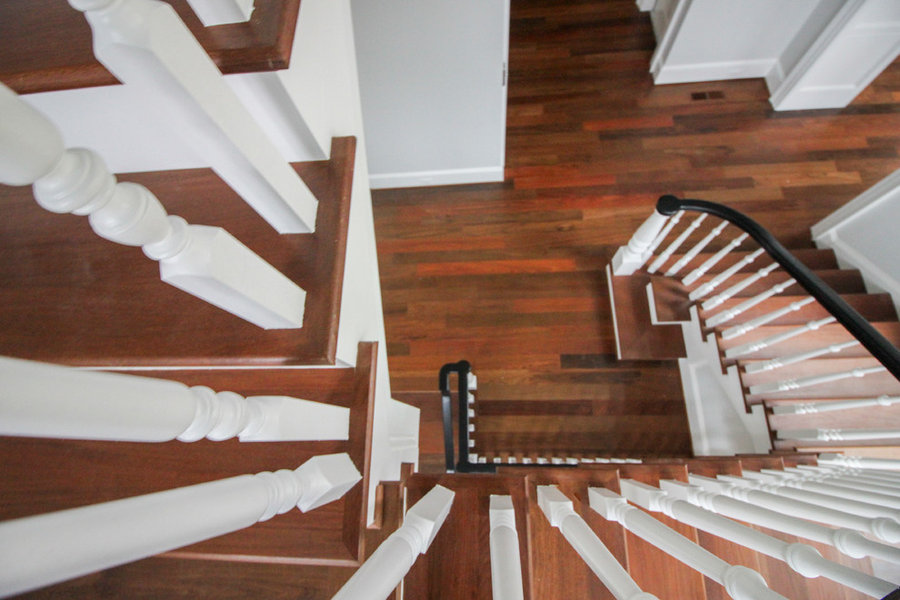 Powerful Impression by Floating Staircase in Suburban Foyer