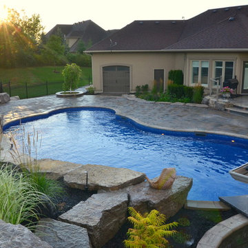 Curvaceous Pool and multi level patio