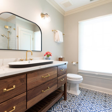 Guest Bathroom Retreat with Timeless Wood Vanity and Blue Patterned Tile