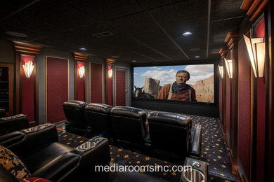 Mid-sized elegant enclosed carpeted and black floor home theater photo in Philadelphia with black walls and a projector screen