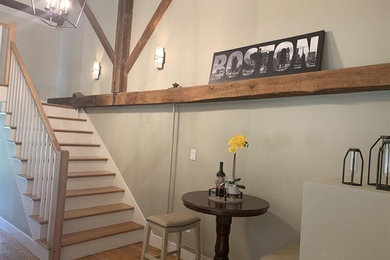 Photo of a transitional home design in Boston.