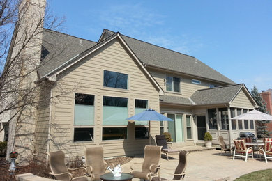 Mid-sized elegant backyard concrete paver patio photo in Cincinnati with no cover