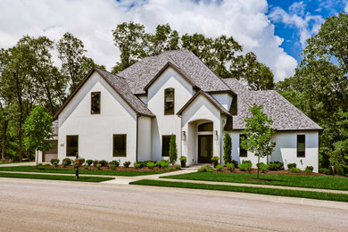 Inspiration for a transitional two-story house exterior remodel in Other