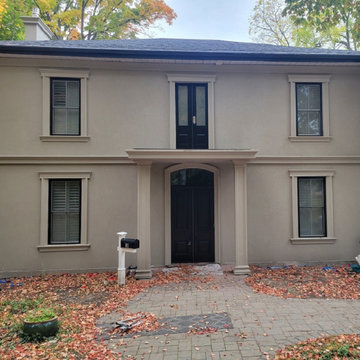 Restoring the exterior stucco of a 150 year old Guelph Home
