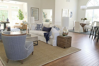 Example of a beach style living room design in Charleston