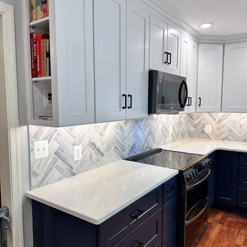 White upper cabinets with phone charging station