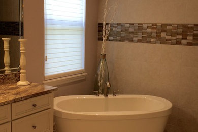 Design ideas for a transitional bathroom in Tampa.