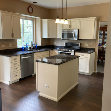 Traditional Kitchen Remodel Done in an Antique White with a Walnut Glaze