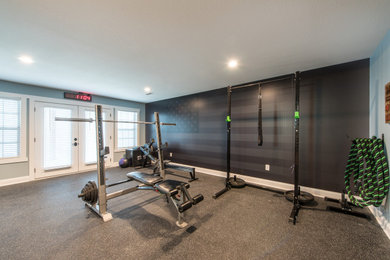 Home gym - rustic home gym idea in Other