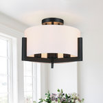 TRUE FINE - 14" W 3-Light Matte Black Semi-Flush Mount Ceiling Light With Drum Shade - Add a touch of modern rustic style to your home with this 3-light semi-flush mount ceiling light. The sleek matte black metal frame and white fabric drum shade give this fixture a unique blend of industrial, rustic, and traditional elements. Perfect for transitional decor, this light is ideal for hallways, entryways, closets, and even bedrooms. Vintage-style Edison bulbs are recommended to enhance the farmhouse-industrial vibe.
