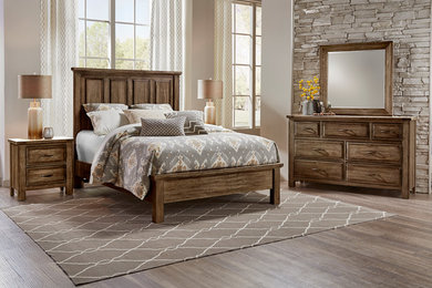 Design ideas for a large country bedroom in Other with white walls and medium hardwood floors.