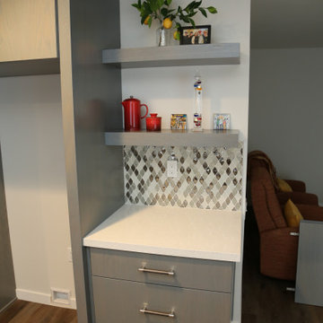 Pieroni Modern Kitchen with Custom Cabinets and Quartz Counter tops