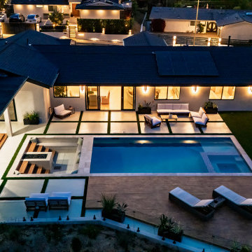 Aerial Over the Pool and Sunken Fire Lounge at Dusk
