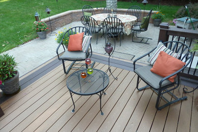 Small contemporary backyard deck in Detroit with no cover.