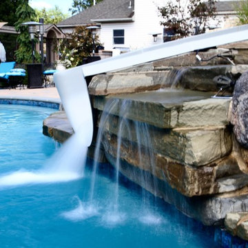 Custom Freeform Pool with Swim Up Bar and Waterslide
