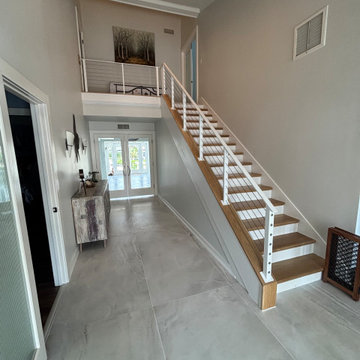 Before & After Cable Railing Staircase Remodel- Longboat Key, FL