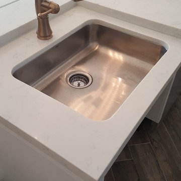 Barrier-free sink with pull out faucet