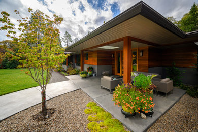 Inspiration for a mid-century modern exterior home remodel in Other