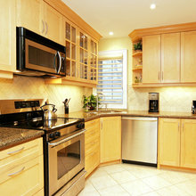 Maple shaker cabinets and brown granite counter re cottage