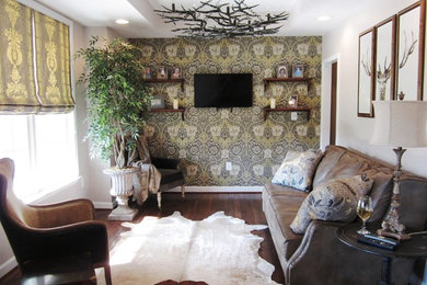 Example of a mid-sized mountain style enclosed and formal medium tone wood floor living room design in DC Metro with beige walls and a wall-mounted tv
