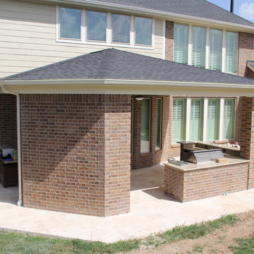 Patio Cover, Outdoor Kitchen, Fireplace, and Water Feature in Cross Creek Ranch