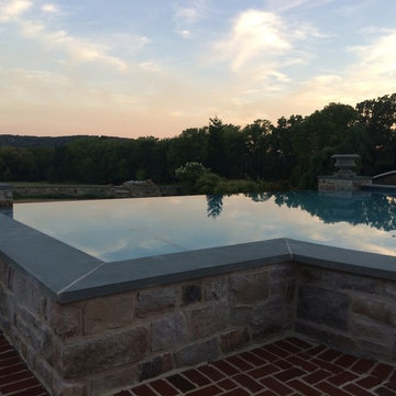Infinity edge pool with underground grotto