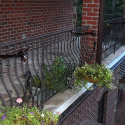 Custom plant hangers for iron railing - Products