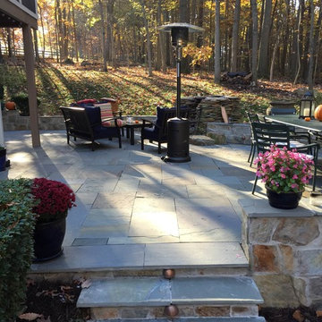 Stone Steps with Embedded lighting provide access from the driveway