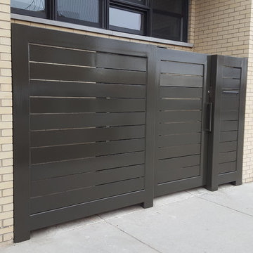 Rolling steel pedestrian / privacy gate and fence with mailbox