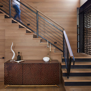This is an example of a medium sized and mixed contemporary wood l-shaped staircase in San Francisco with metal risers.