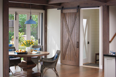 Inspiration for a contemporary kitchen/dining room combo remodel in Denver