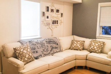 Inspiration for a contemporary dark wood floor and brown floor living room remodel with gray walls, no fireplace and no tv