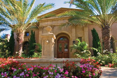 Photo of a large mediterranean partial sun backyard stone water fountain landscape in New York.