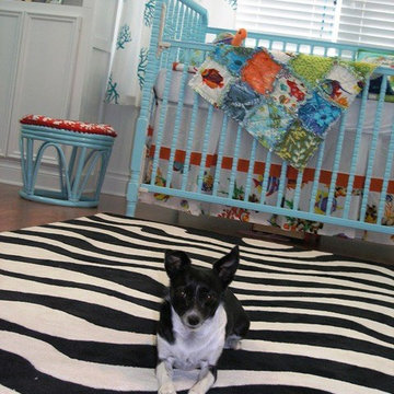 Caya Coyote Dog Blending Right Into the Abstract Zebra Print Rug