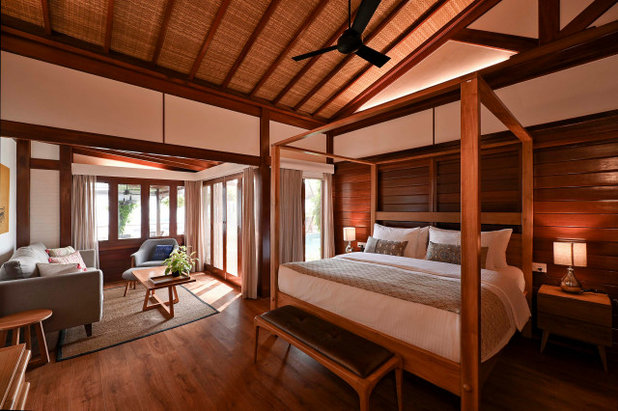 Tropical Bedroom by ARCHITECTURE, INTERIORS AND LANDSCAPES