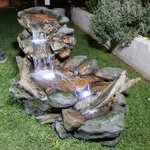 Alpine Corporation - 60" Long 3-Tier Rainforest Rock River Hand-Painted Fountain with LED Lights - Relax and enjoy the sounds of nature with the Alpine Corporation 3-Tier Rock River Fountain! With this high-quality fountain, you can create a meditative, relaxing atmosphere, even in an urban jungle. The waterfall looks great in your garden, patio, deck, porch, or yard space. Take in the tranquil sounds of the water gently cascading over natural-looking gray stone and wood logs. The polystone and fiberglass construction is weatherproof, rust-resistant, and durable for years of quality use. To use, simply plug into an outdoor outlet, fill lower level with water, and watch as the interior pump creates a lovely water flow reminiscent of a lush rainforest river or stream. LED lights in each of the 3 tiers illuminate your space, drawing attention to the relaxing water pools day or night for added ambiance. Due to the hand-painted nature of the product, color variations may occur. With a 1-year warranty, you can be confident in the quality of your purchase. Fountain measures 60"L x 33"W x 28"H for use in yards of any size. Alpine Corporation is one of America's leading designers, importers, and distributors of superior quality home and garden decor products. Alpine Corporation's award winning in-house design team continuously develops new and innovative "statement pieces" for your home and garden. Your indoor and outdoor living spaces will be the envy of the neighborhood with our wide assortment of fresh, fashionable and contemporary products, from beautifully crafted solar garden stakes featuring patented motion and fiber optic lighting technology to beautiful fountains and delightful bird baths and feeders.