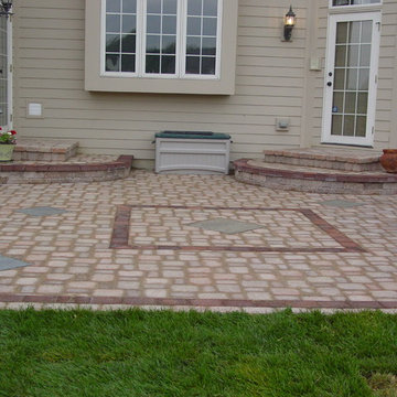 Formal paver patio gardens