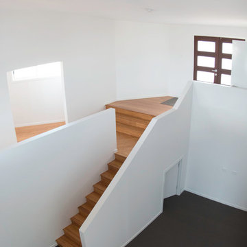 WINNER 2016 - Staircase to the lower floor kids bedrooms and play area.