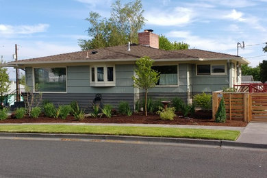 Inspiration for a mid-sized mid-century modern full sun side yard formal garden in Other for summer.